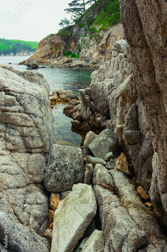 Rocks and sea, rocky coastline of the Bay. © Evgeniy