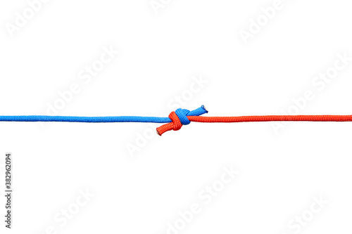 Knot on a cord isolated on a white background .