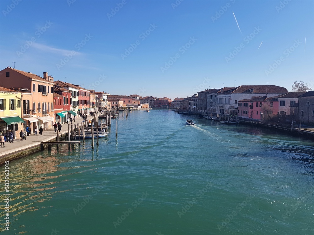 View of Murano (Venice) from a bridge over the river. Murano (Venice) architecture.