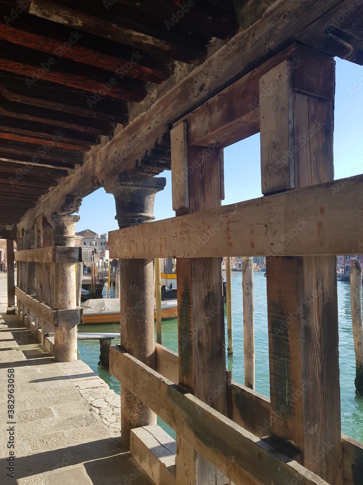 Under a bridge in Murano (Venice). Murano (Venice) architecture. Under a bridge in Murano (Venice). Murano (Venice) architecture.
