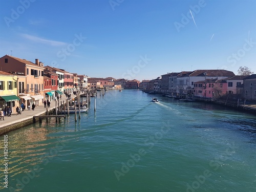 View of Murano (Venice) from a bridge over the river. Murano (Venice) architecture.