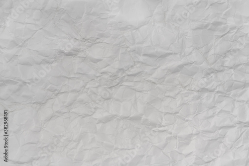Crumpled white paper background texture