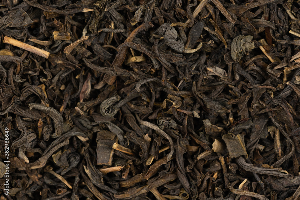 Dried tea leaves background texture. close-up Dried tea leaves background texture. close-up