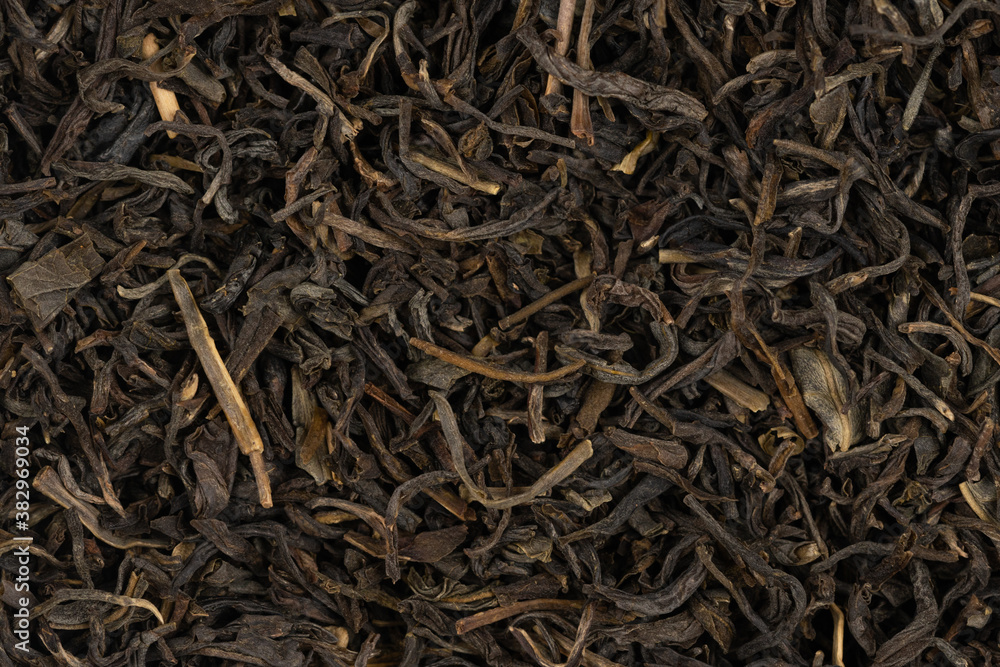 Dried tea leaves background texture. close-up Dried tea leaves background texture. close-up