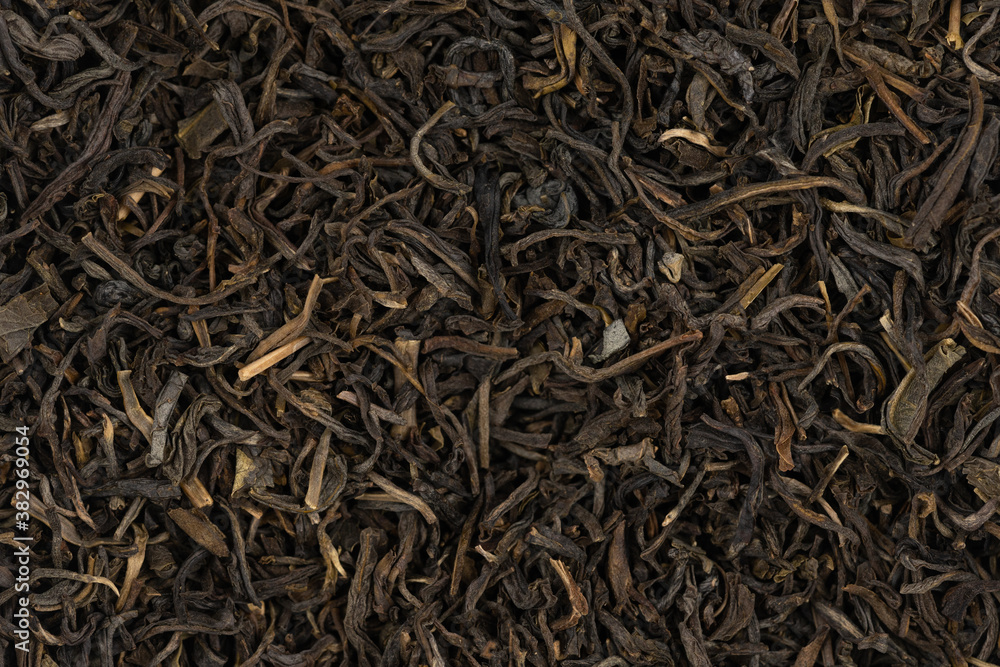 Dried tea leaves background texture. close-up Dried tea leaves background texture. close-up