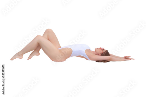 Woman in a white swimsuit isolated on white background.