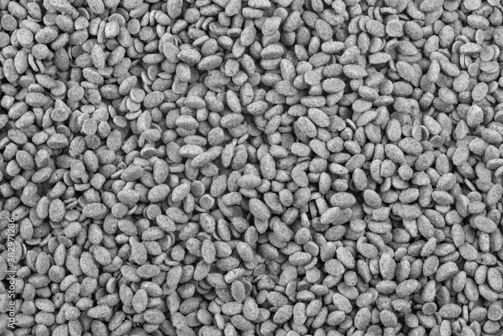 Food for animals background. Dry cat and dog food texture. Pet meal background close up Food for animals background. Dry cat and dog food texture. Pet meal background close up
