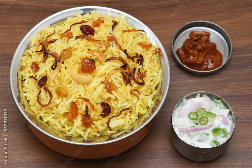 Veg biryani. Spicy Indian Malabar biryani or Hydrabadi biryani, Dum Biriyani, pulao, pulav, pilaf, basmati rice, spicy mixed rice dish with meat curry for Ramadan Kareem, Eid Veg biryani. Spicy Indian Malabar biryani or Hydrabadi biryani, Dum Biriyani, pulao, pulav, pilaf, basmati rice, spicy mixed rice dish with meat curry for Ramadan Kareem, Eid
