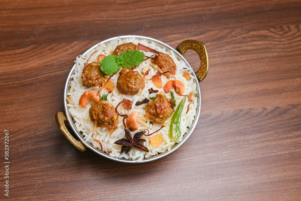 Veg biryani or soya biryani. Spicy Indian Malabar biryani or Hydrabadi biryani, Dum Biriyani, pulao, pulav, pilaf, basmati rice, spicy mixed rice dish with meat curry for Ramadan Kareem, Eid Veg biryani or soya biryani. Spicy Indian Malabar biryani or Hydrabadi biryani, Dum Biriyani, pulao, pulav, pilaf, basmati rice, spicy mixed rice dish with meat curry for Ramadan Kareem, Eid