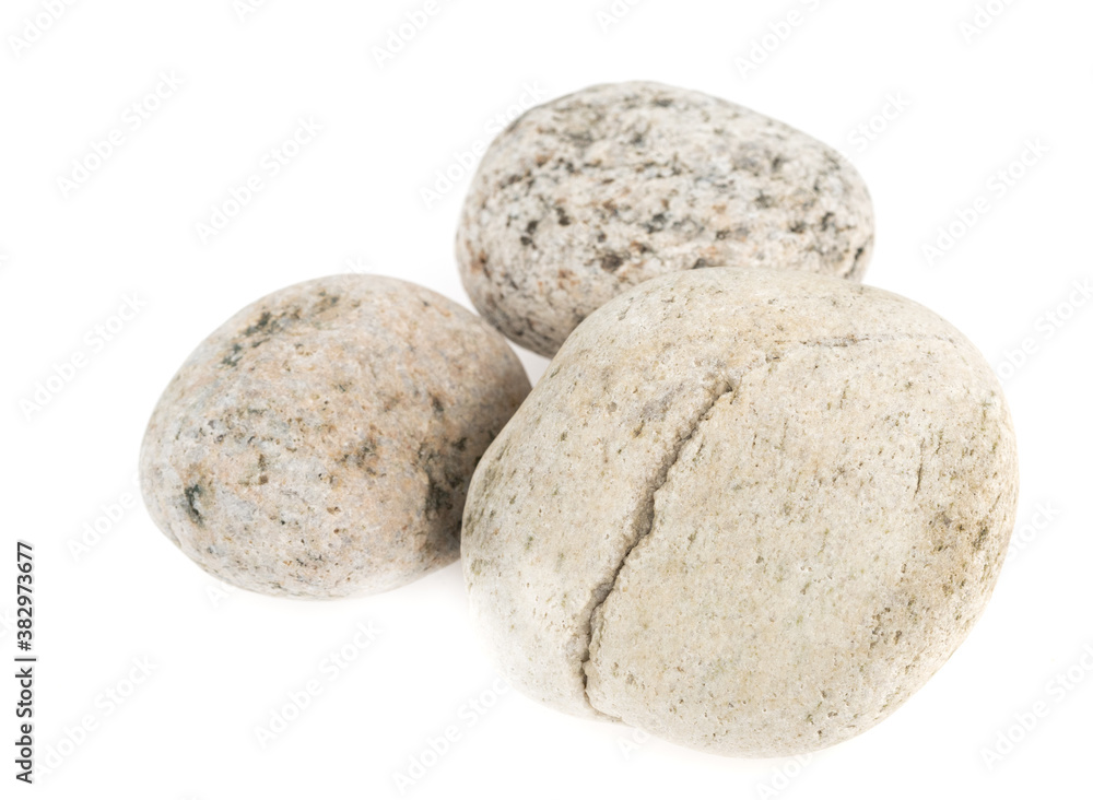 Natural large stone, cobblestone isolated on white background. stones for baths and saunas Natural large stone, cobblestone isolated on white background. stones for baths and saunas
