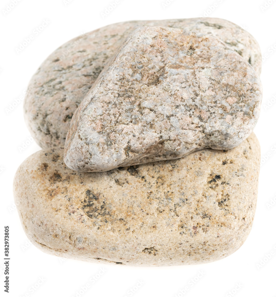 Obraz premium Natural large stone, cobblestone isolated on white background. stones for baths and saunas