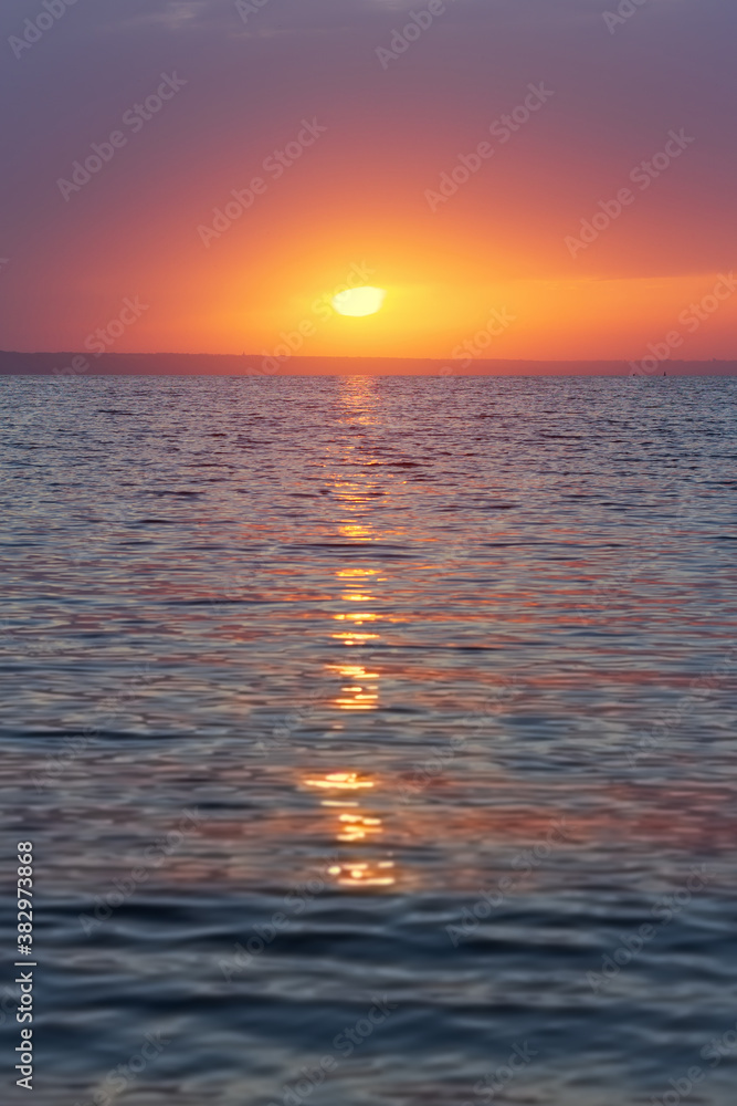 photo of early sunrise / calm sea reservoirs of Ukraine