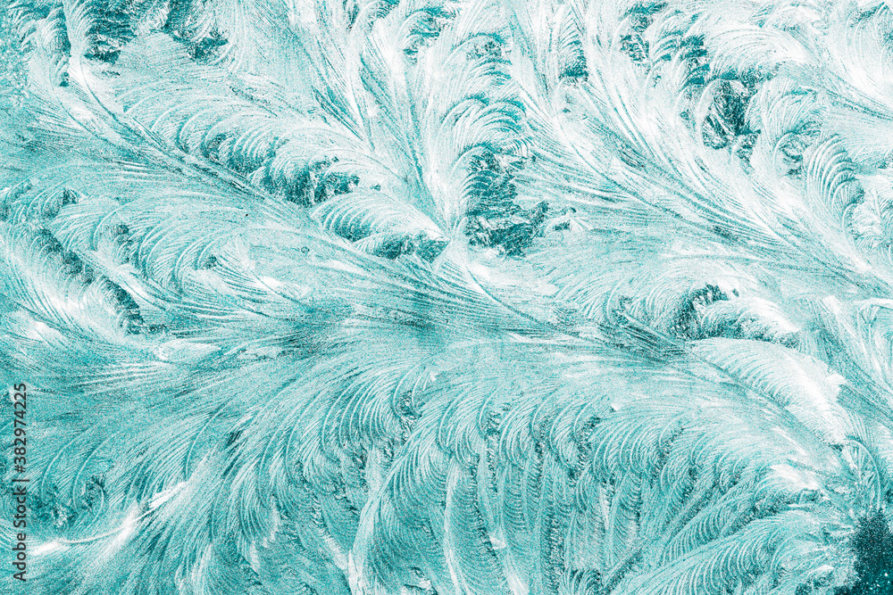 Obraz premium Blue Frosty Glass Ice Background, Natural Beautiful Snowflakes Frost Ice Pattern. Winter Xmas Christmas Abstract Backdrop, Background Or Texture. Turquoise Blue Colour.