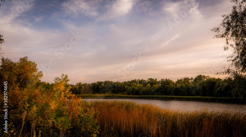  Autumn views of the evening lake Krugloye. Natural park "Volgo-Akhtubinskaya floodplain". Russia. Volgograd region