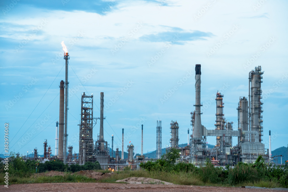 Oil refinery gas petrol plant industry with crude tank, gasoline supply and chemical factory. Petroleum barrel fuel heavy industry oil refinery manufacturing factory plant. Refinery industry concept Oil refinery gas petrol plant industry with crude tank, gasoline supply and chemical factory. Petroleum barrel fuel heavy industry oil refinery manufacturing factory plant. Refinery industry concept