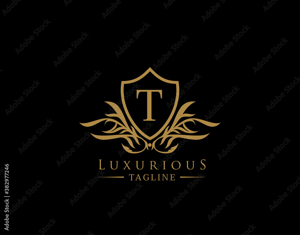 Classic Shield Logo With T Letter. Elegant Shield badge With Floral Shape perfect for fashion, Boutique, Jewelry, Hotel, Restaurant. Classic Shield Logo With T Letter. Elegant Shield badge With Floral Shape perfect for fashion, Boutique, Jewelry, Hotel, Restaurant.