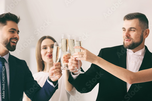 Young people clinking glass...
