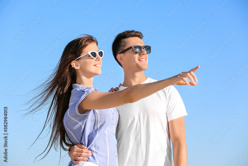 Happy young couple on sea beach Happy young couple on sea beach