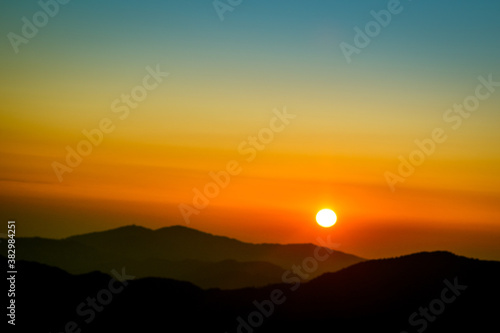 Sunrise over the mountains. Early morning scenic view of Sandakphu (3665 m; 11,930 ft) is the highest point of the Singalila Ridge in Nepal on the West Bengal-Nepal border 