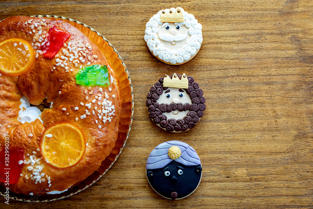 Cookies of The three Wise Man next to a delicious Spanish Christmas cake Cookies of The three Wise Man next to a delicious Spanish Christmas cake