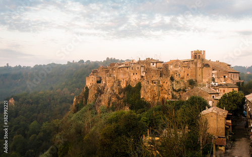 Dawn over the medieval commune town of Calcata in Italy depopulated in 1930th for fear of collapse and then repopulated by artists and hippies in 1960 photo