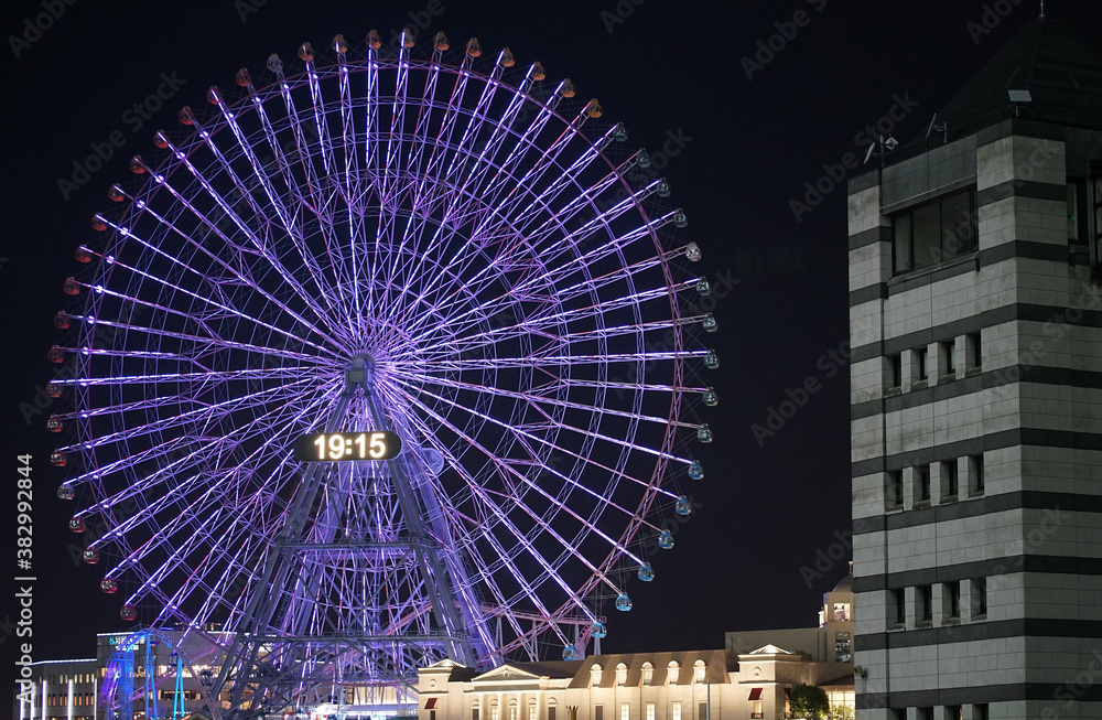 Night view of the Ferris wheel of the blue light