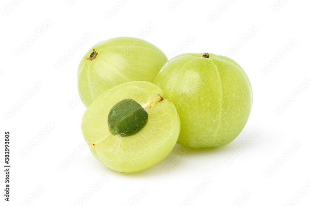 Fresh Indian gooseberry fruits with cut in half isolated on white background. Clipping path. Fresh Indian gooseberry fruits with cut in half isolated on white background. Clipping path.