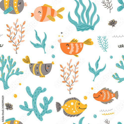 Seamless pattern with sea fish and algae.