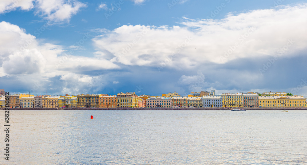 Panorama of Saint Petersburg Leningrad city with row of old colorful buildings on embankment riverfront of Neva river in historical city centre, Russia, Panoramic view of Saint Petersburg cityscape