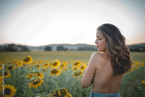 Girls in sunflower field
