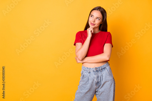 Photo of lady look wondered up empty space arm on chin wear casual red top denim isolated yellow color background