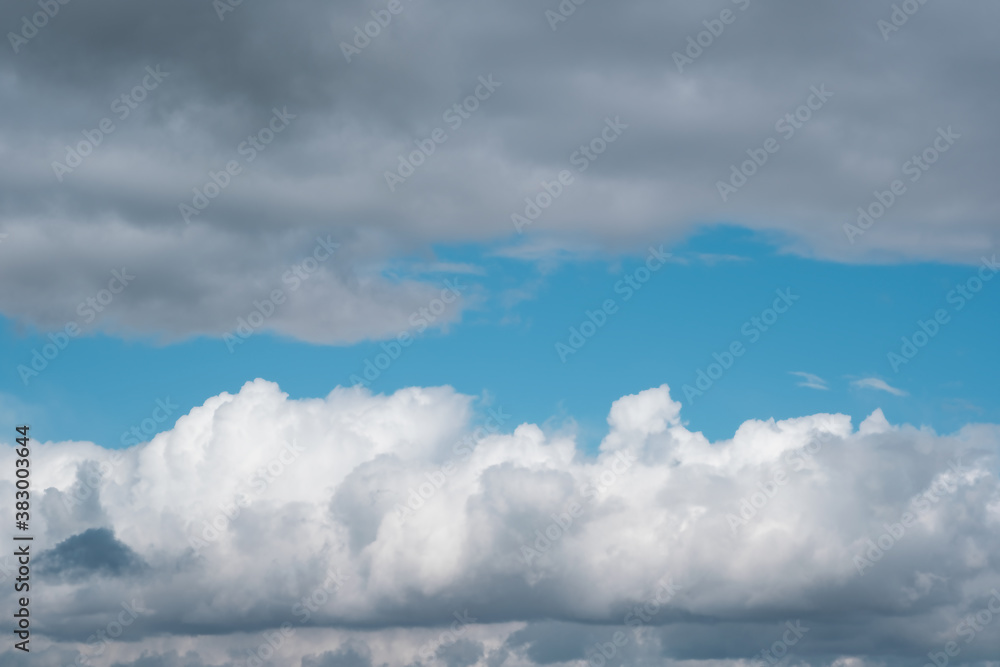 Blue sky with white and gray clouds, texture Blue sky with white and gray clouds, texture
