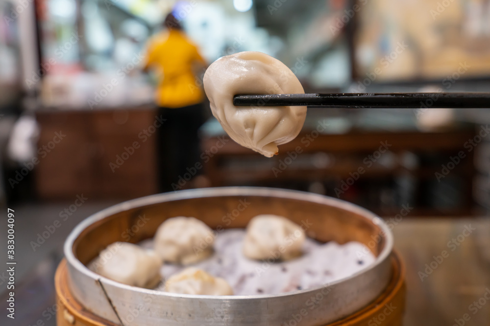 Soup dumplings in bamboo cages, a traditional snack in Nanjing, China Soup dumplings in bamboo cages, a traditional snack in Nanjing, China