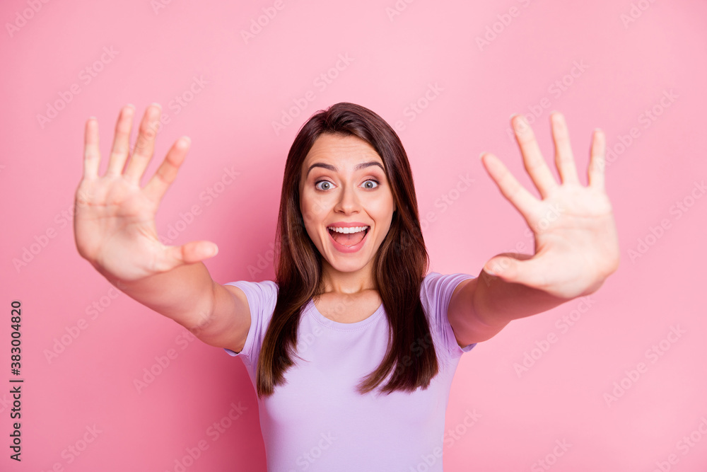 Portrait of amazed young lady show ten fingers wear casual violet cloth isolated on pink color background Portrait of amazed young lady show ten fingers wear casual violet cloth isolated on pink color background