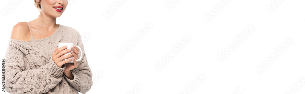 cropped view of woman in trendy sweater holding cup of tea isolated on white, website header cropped view of woman in trendy sweater holding cup of tea isolated on white, website header