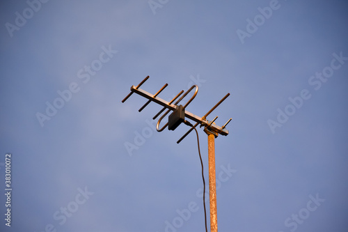 Short yagi antenna on the roof to receive signal from the television, radio and wifi station nearby.