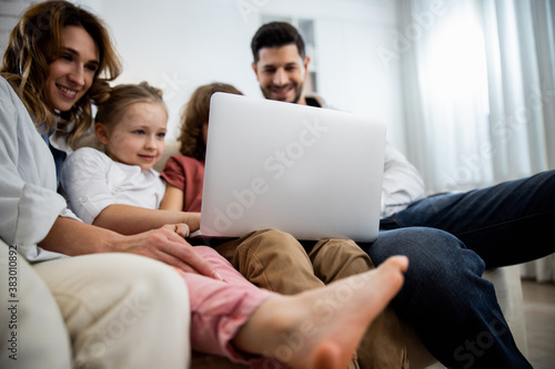 Kids relaxing on couch at home