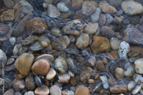 Stones on the beach Danube river Bratislava, Decorative stone wallpaper with nature texture