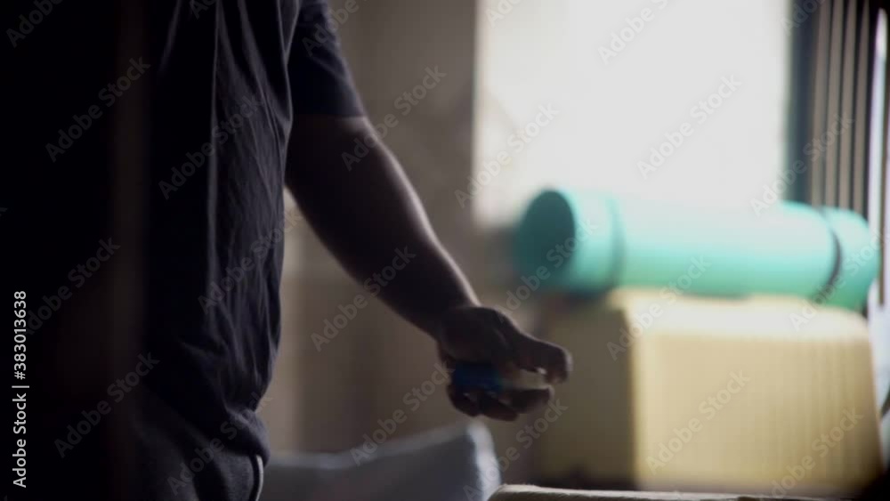 spraying sanitizer small spray on hand then rubbing both after coming home smlow motion spraying sanitizer small spray on hand then rubbing both after coming home smlow motion