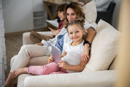 Mother sitting on the couch