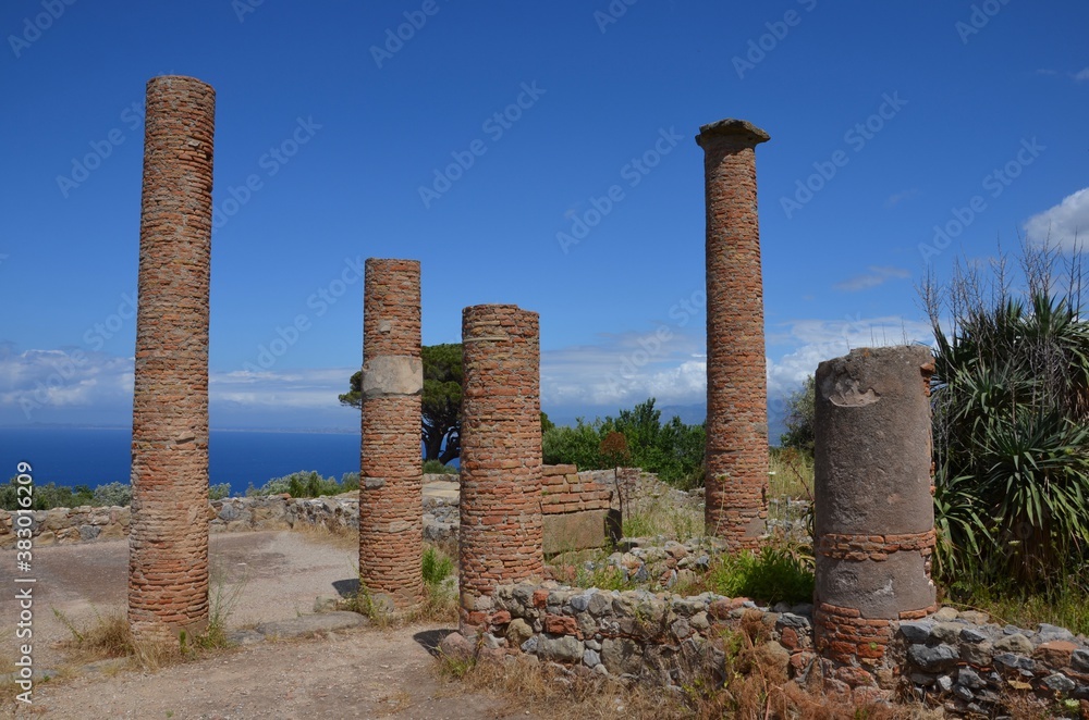 Ruins of Tindari with view to mediterranean sea, Sicily, Italy, blue sky background