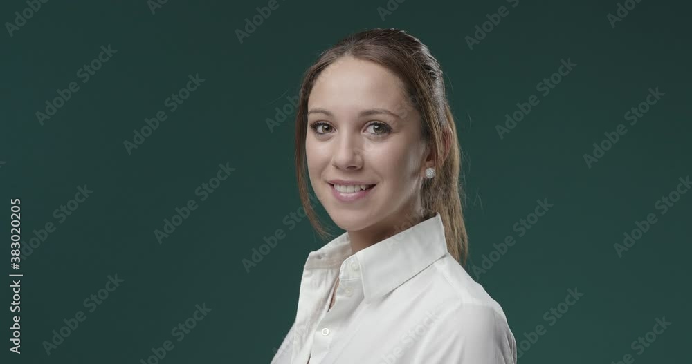 Smiling young woman in white shirt Smiling young woman in white shirt