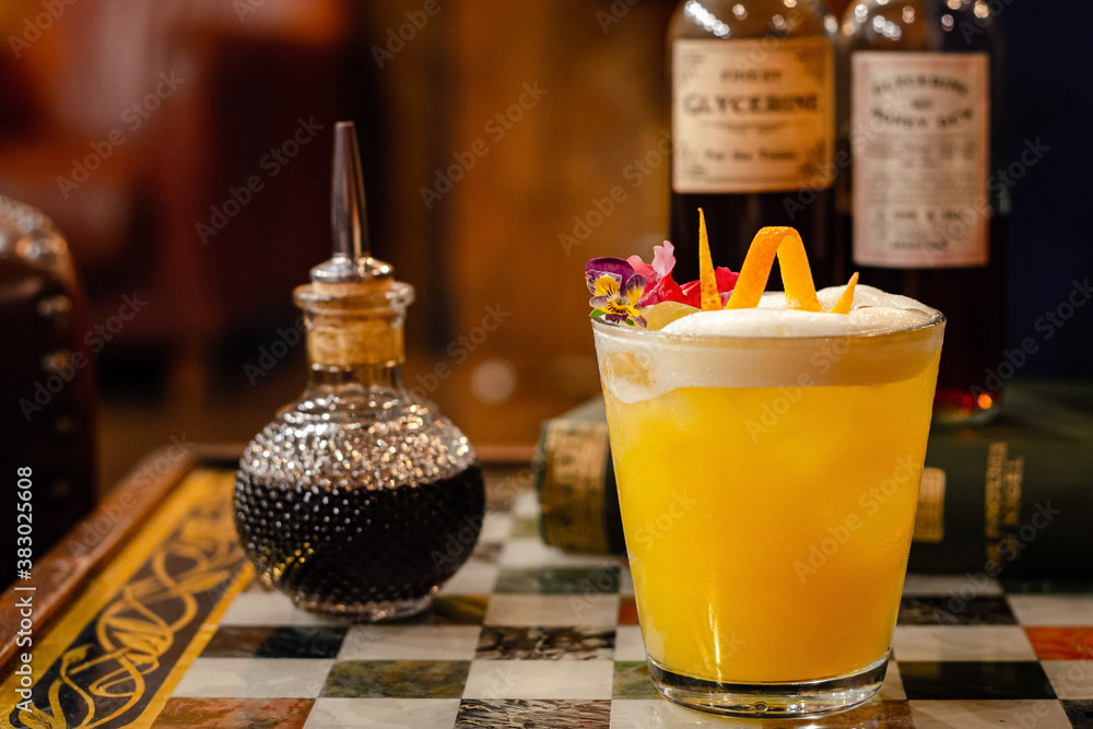 Fancy drink set up on checkerboard in a antique vip room side view Fancy drink set up on checkerboard in a antique vip room side view