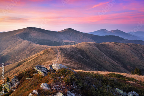 Landscape with amazing sunrise. Autumn morning in high mountains. Natural scenery. A place to relax in the Carpathian Park.
