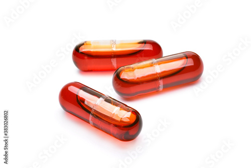 Photos Natural Krill Oil Capsules isolated on white background.
