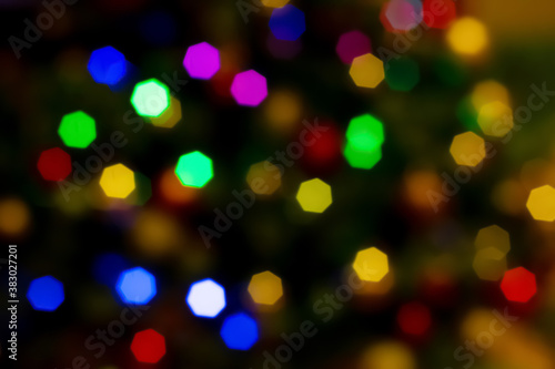 Abstract blurred disfocused Christmas lights festive background.