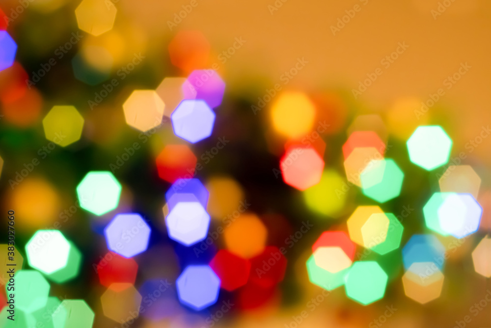 Abstract blurred disfocused Christmas lights festive background.