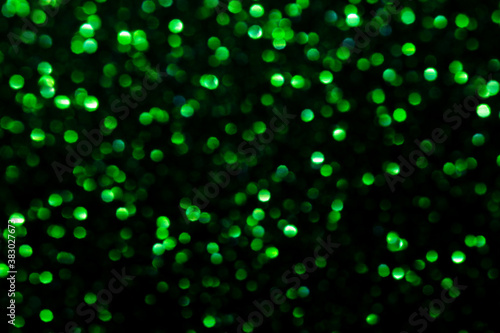 blured green glitter texture abstract background