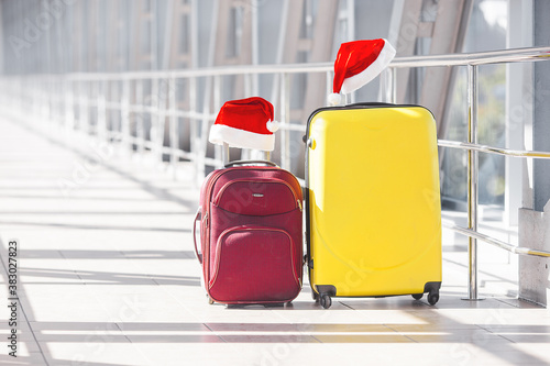 Suitcases christmas background. Traveling concept