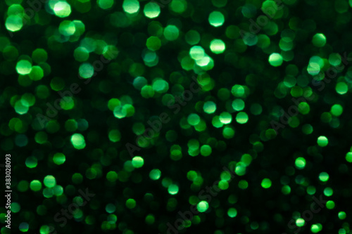 blured green glitter texture abstract background